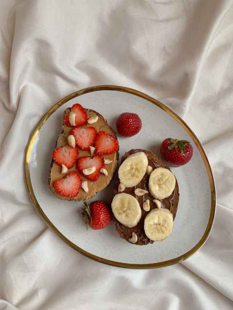 slices of strawberries on a toasted bread